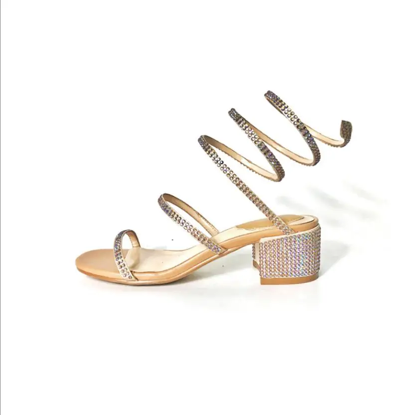 Rhinestone snake-shaped winding sandals female summer 2019 new sexy word with high heels thick with the middle with Roman straps
Rhinestone snake-shaped winding sandals female summer 2019 new sexy word with high heels thick with the middle with Roman straps
