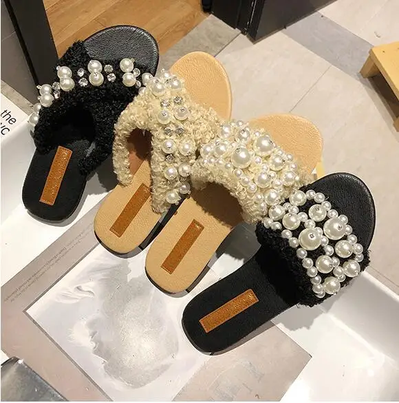 2019 new fur slippers female summer fashion wear net red holiday national wind flat bottom pearl word sandaling
2019 new fur slippers female summer fashion wear net red holiday national wind flat bottom pearl word sandaling