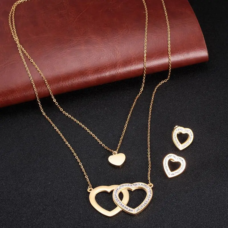 Woman Jewelry Set Necklare Stud Earring Stainless Steel Gold Plating Cubic Zirconia Love Heart Pendant Earrings Wedding Jewelry
Woman Jewelry Set Necklare Stud Earring Stainless Steel Gold Plating Cubic Zirconia Love Heart Pendant Earrings Wedding Jewelry