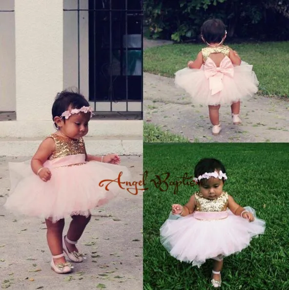 Lovely pink short tutu flower girl dresses 1st birthday with bling golden sequins keyhole back baby princess dress with bow
Lovely pink short tutu flower girl dresses 1st birthday with bling golden sequins keyhole back baby princess dress with bow
