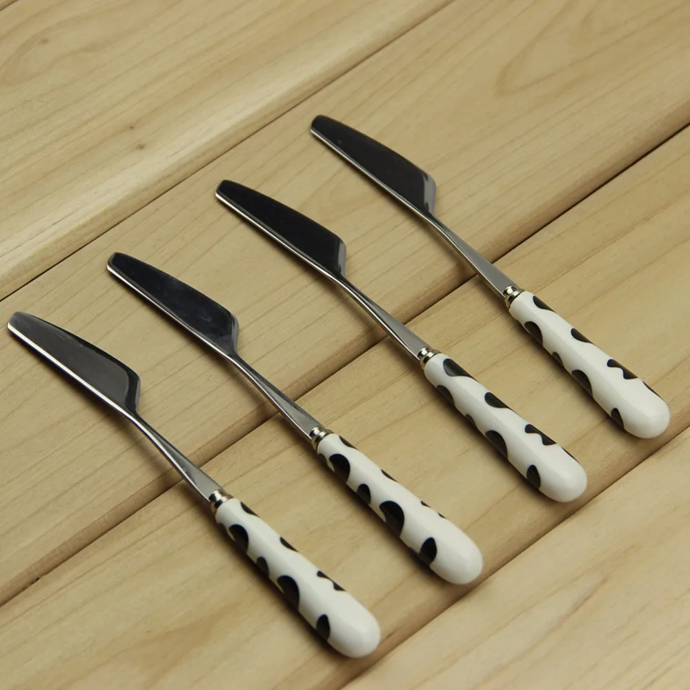 2pcs Butter knife Stainless Steel Cheese Knife Tools Funny Ceramics Handle (Black and Brown)
2pcs Butter knife Stainless Steel Cheese Knife Tools Funny Ceramics Handle (Black and Brown)