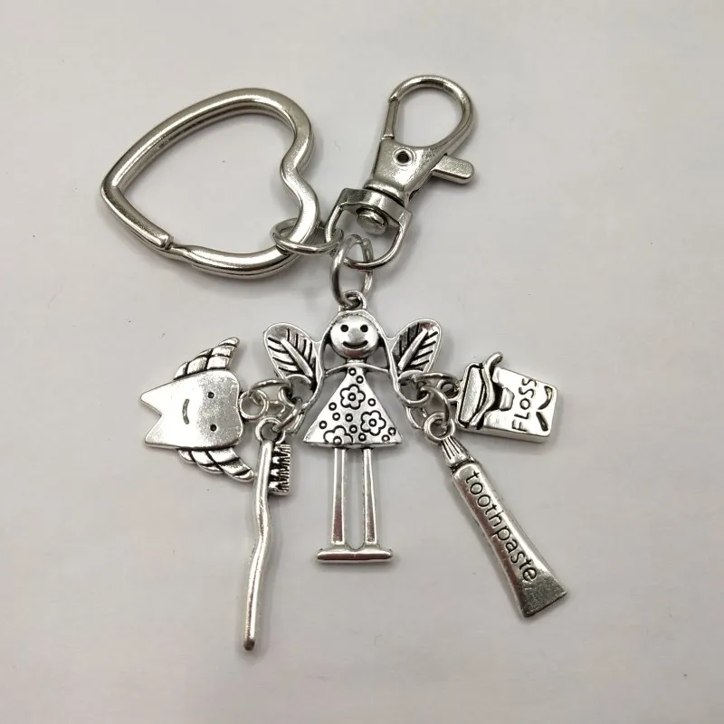 Dentist Gift Tooth Fairy Purse Charm dental surgeon wisdom tooth extraction present fairy unique hygienist birthday present
Dentist Gift Tooth Fairy Purse Charm dental surgeon wisdom tooth extraction present fairy unique hygienist birthday present