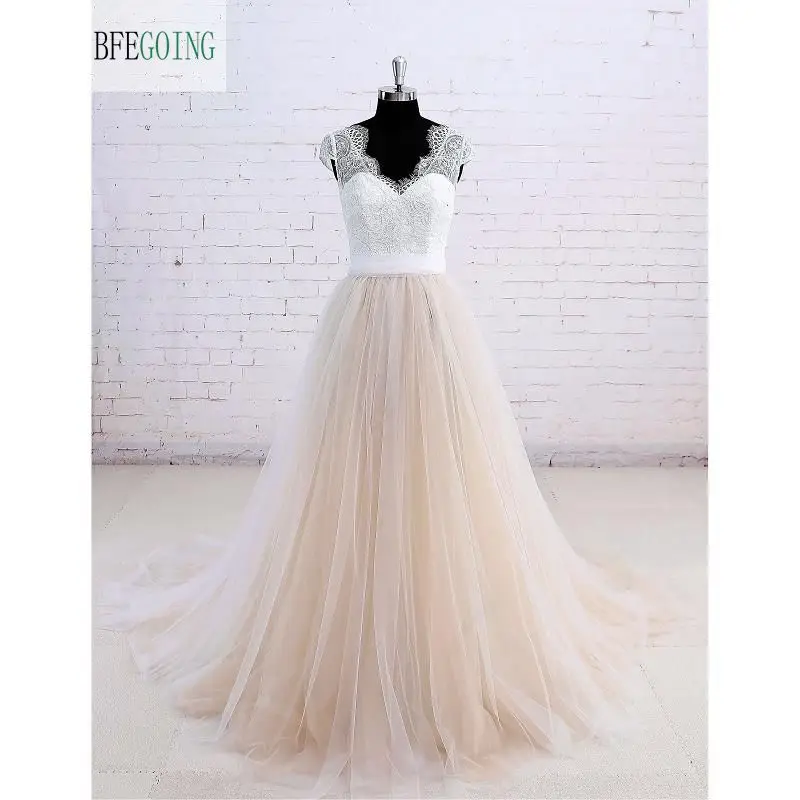 Ivory Lace Champagne Skirt A-line Wedding Dress Court Train V-Neck Cap Sleeves Real/Original Photos Custom made
Ivory Lace Champagne Skirt A-line Wedding Dress Court Train V-Neck Cap Sleeves Real/Original Photos Custom made