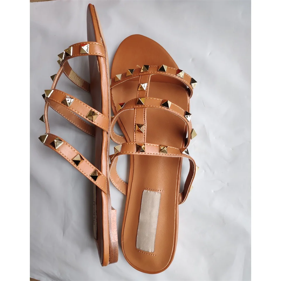 Rivet slippers female summer fashion sandals real leather material beautiful rivet decoration open toe flat shoes women slippers
Rivet slippers female summer fashion sandals real leather material beautiful rivet decoration open toe flat shoes women slippers