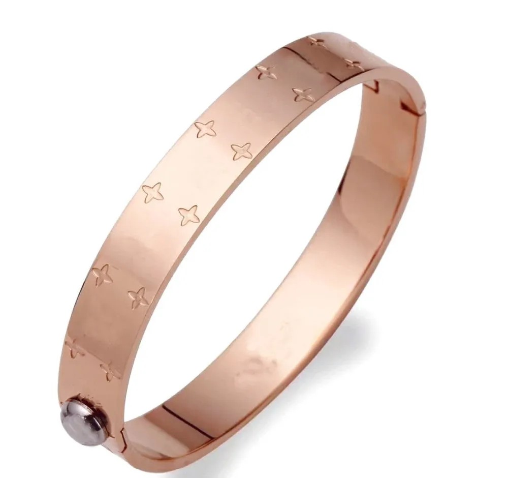 New hot Brand fashion high quality V letter oval bracelet bangle with flowers on and women bracelet stainless steel never fade
New hot Brand fashion high quality V letter oval bracelet bangle with flowers on and women bracelet stainless steel never fade