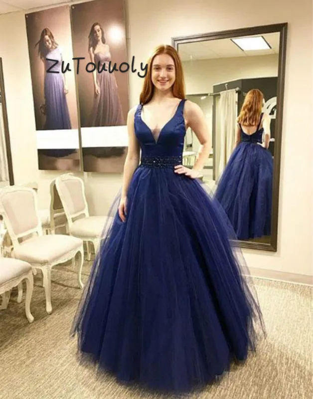 Beautiful Navy Blue Backless Prom Dress With Beaded Sash A Line V Neck Tulle Floor Length Elegant Plus Size Evening Gowns 2019
Beautiful Navy Blue Backless Prom Dress With Beaded Sash A Line V Neck Tulle Floor Length Elegant Plus Size Evening Gowns 2019