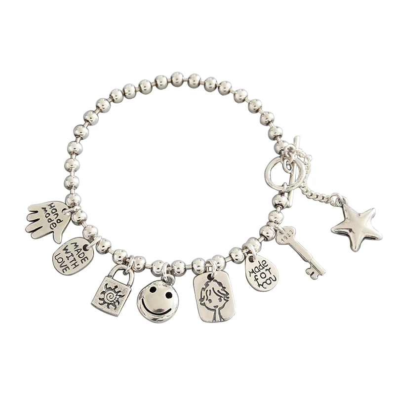 S925 Sterling Silver Lady Bracelet with retro smiling face doll Thai silver key ball square alphabet charm
S925 Sterling Silver Lady Bracelet with retro smiling face doll Thai silver key ball square alphabet charm