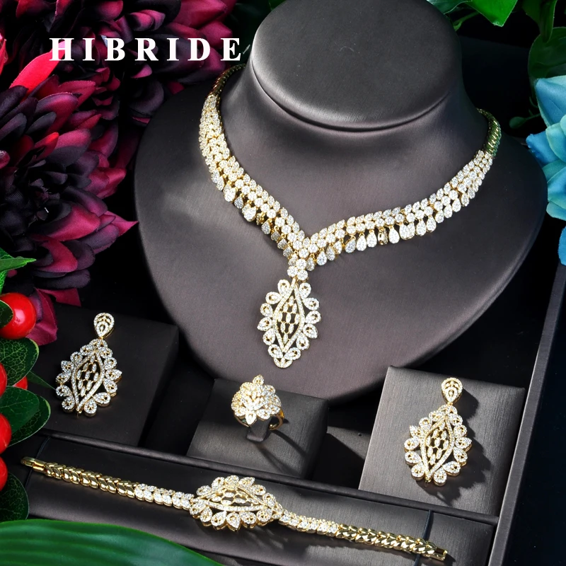 Роскошное золотистое Свадебное колье HIBRIDE в нигерийском стиле с каплями воды из фианита, Дубай, комплект из 4 шт. ювелирных изделий для платья, подарки для вечеринки
Роскошное золотистое Свадебное колье HIBRIDE в нигерийском стиле с каплями воды из фианита, Дубай, комплект из 4 шт. ювелирных изделий для платья, подарки для вечеринки