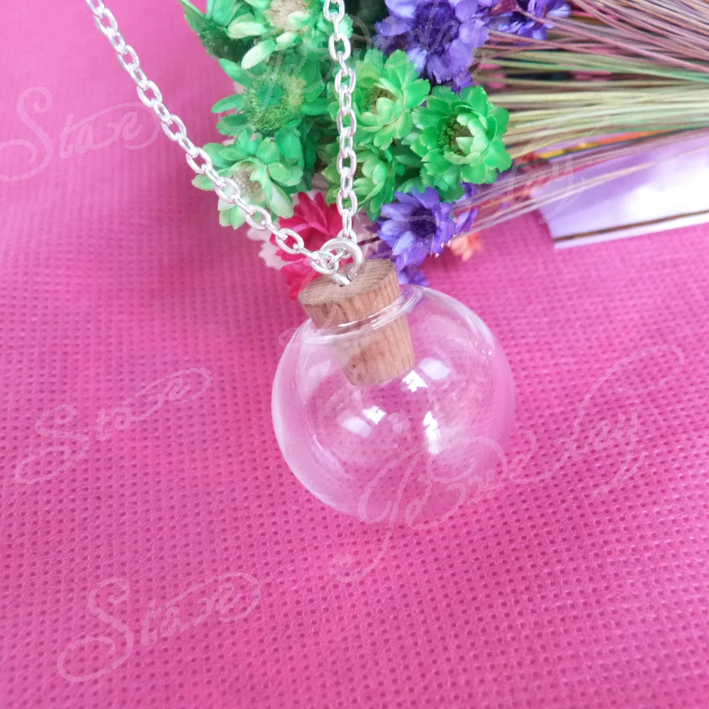 10set/lot--25mm round ball shape clear glass vial bottle with cork with eyehook with 55cm silver chain
10set/lot--25mm round ball shape clear glass vial bottle with cork with eyehook with 55cm silver chain