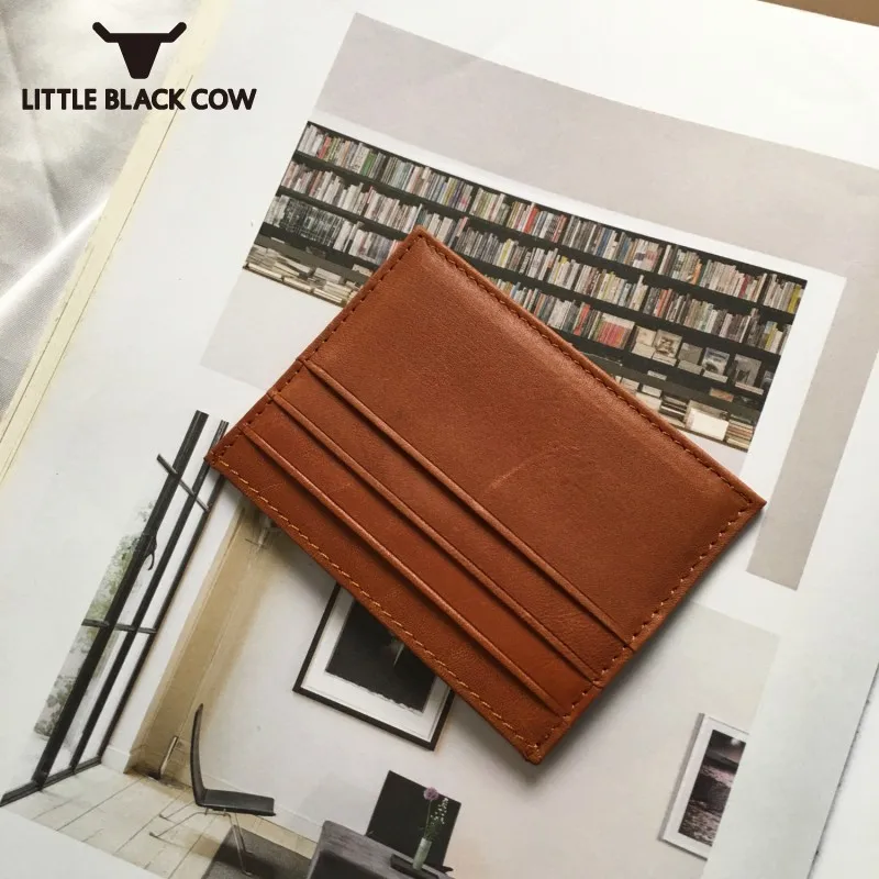 Hot Sale Mens Genuine Leather Small Change Pocket Card Packing Mini Wallet Solid Color Carteira Bag Porte Feuille Femme
Hot Sale Mens Genuine Leather Small Change Pocket Card Packing Mini Wallet Solid Color Carteira Bag Porte Feuille Femme