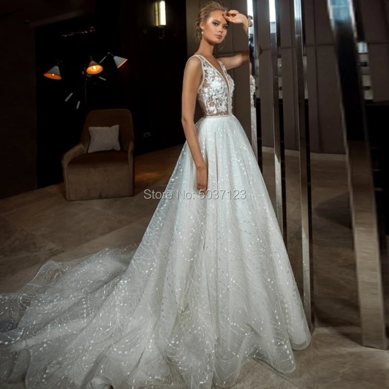 Sparkling A Line Wedding Dresses Deep V Neck Sleeveless Lace Appliques Bridal Gowns Court Train Vestido De Noiva
Sparkling A Line Wedding Dresses Deep V Neck Sleeveless Lace Appliques Bridal Gowns Court Train Vestido De Noiva