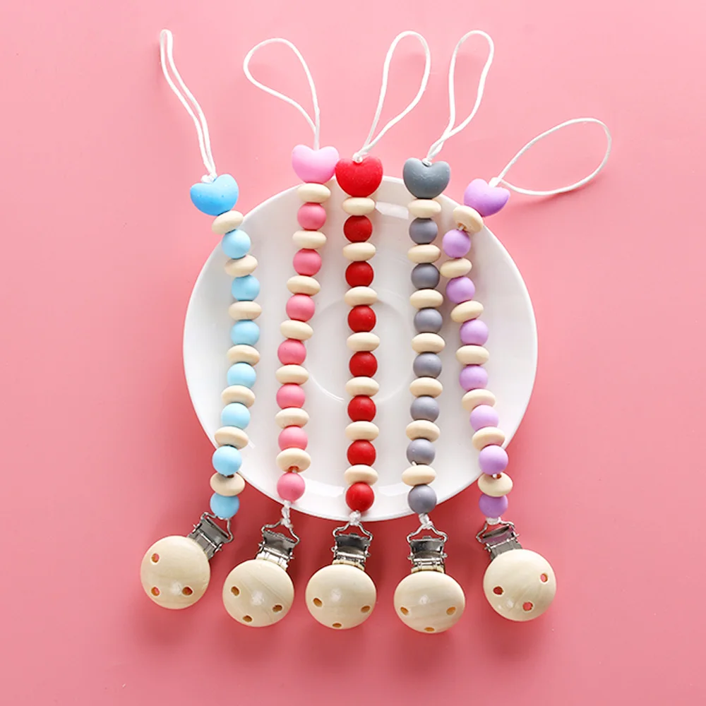 1Pcs BPA Free Wooden Non-toxic Baby Nipple Clips Dummy Clasps Pacifier Circle Teething Newborn Product Soother Holder
1Pcs BPA Free Wooden Non-toxic Baby Nipple Clips Dummy Clasps Pacifier Circle Teething Newborn Product Soother Holder