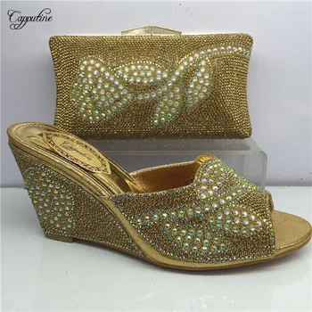 Excellent gold wedge high heel African sandal shoes and evening bag set with rhinesones GY28, heel height 8cm
Excellent gold wedge high heel African sandal shoes and evening bag set with rhinesones GY28, heel height 8cm