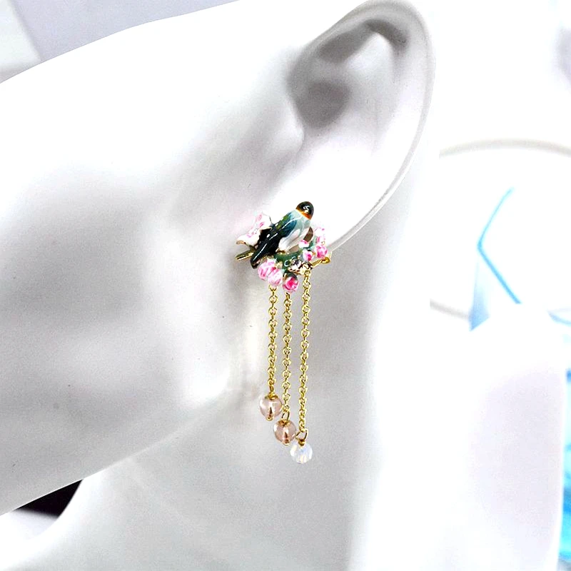 New enamel glazed cherry blossom blue tuxedo magpie tweeted bird long section tassel female earrings 925 silver needles
New enamel glazed cherry blossom blue tuxedo magpie tweeted bird long section tassel female earrings 925 silver needles