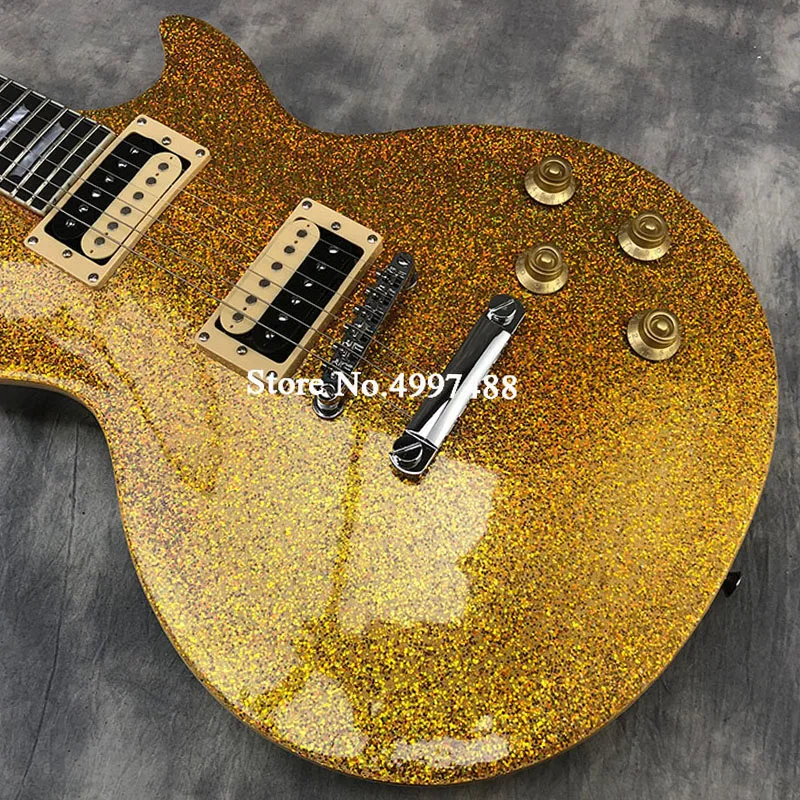 The new yellow big grain electric guitar, fixed bridge, flowerpot inlay, gold powder big grain. Real photos, free delivery
The new yellow big grain electric guitar, fixed bridge, flowerpot inlay, gold powder big grain. Real photos, free delivery