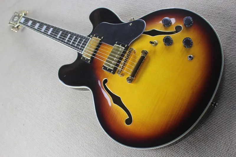 China guitar factory custom 100% New Vintage Sunburst F Hole Hollow Body ES 335 Electric Guitar free shipping 914
China guitar factory custom 100% New Vintage Sunburst F Hole Hollow Body ES 335 Electric Guitar free shipping 914