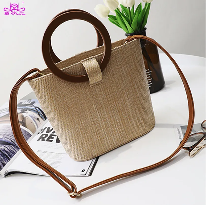 TZY 2018 New Trend Straw Bag Package Women Beach Vacation Handbag Round Wood Handle Summer Beach Shoulder Bag Lady Wicker bag
TZY 2018 New Trend Straw Bag Package Women Beach Vacation Handbag Round Wood Handle Summer Beach Shoulder Bag Lady Wicker bag