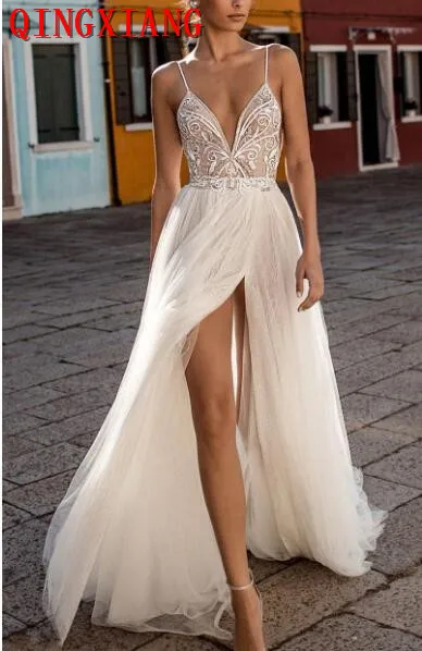 2019 Deep V Neck Spaghetti Sexy Illusion Beach Wedding Dresses Backless Bohemian Bridal Gown Beading Top Tulle Side High Split
2019 Deep V Neck Spaghetti Sexy Illusion Beach Wedding Dresses Backless Bohemian Bridal Gown Beading Top Tulle Side High Split