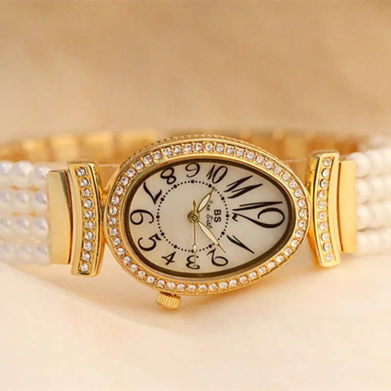 Luxury Women Rhinestone Casual Dress Quartz Wristwatch New Pearl Band Woman Watch Fashion Women Bracelet Watch reloj mujer
Luxury Women Rhinestone Casual Dress Quartz Wristwatch New Pearl Band Woman Watch Fashion Women Bracelet Watch reloj mujer
