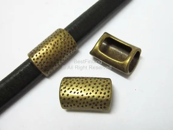 10x6mm Antique bronze Licorice dot textured tube leather bracelet findings -LT01B
10x6mm Antique bronze Licorice dot textured tube leather bracelet findings -LT01B