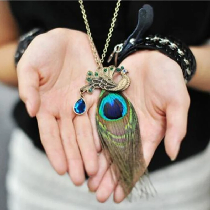 1X Tassel necklace Women Dreamcatcher imitation peacock feathers green leave pendant long chain necklace Vintage gift
1X Tassel necklace Women Dreamcatcher imitation peacock feathers green leave pendant long chain necklace Vintage gift