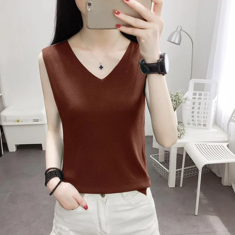 Black and white knitted waistcoat with 2018 spring and summer new loose, small sling, woman sleeveless T - shirt,
Black and white knitted waistcoat with 2018 spring and summer new loose, small sling, woman sleeveless T - shirt,
