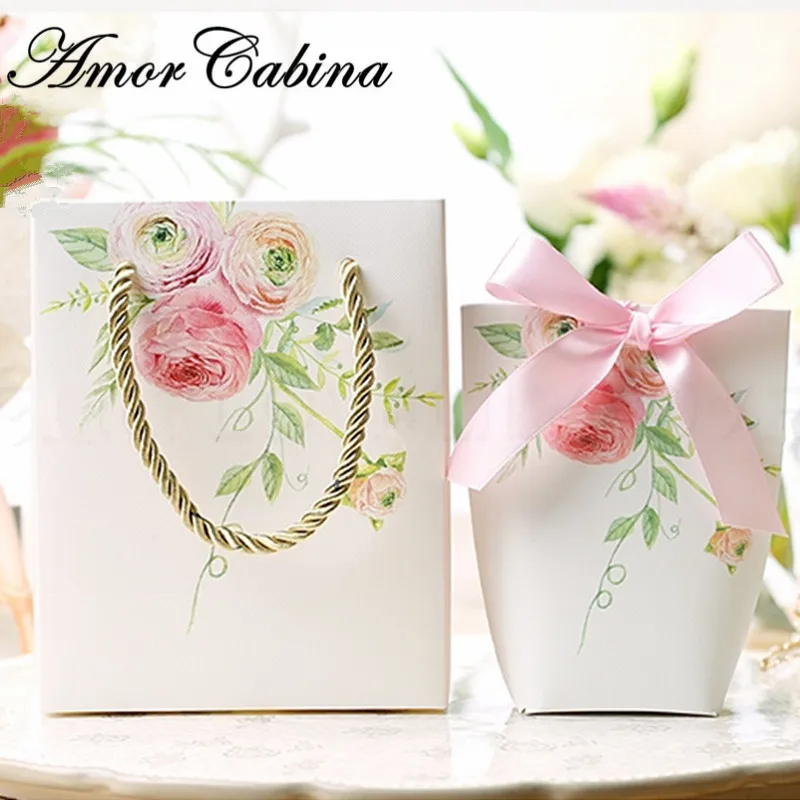 30pcs Wedding party creative pink floral printing candy box packaging bag with handle packaging jewelry Christmas gift bag
30pcs Wedding party creative pink floral printing candy box packaging bag with handle packaging jewelry Christmas gift bag