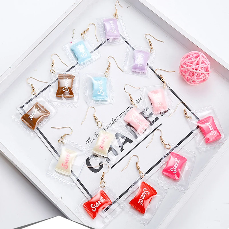 New Korean cute candy transparent earrings long earrings girls personality earrings simple fashion wild earrings
New Korean cute candy transparent earrings long earrings girls personality earrings simple fashion wild earrings
