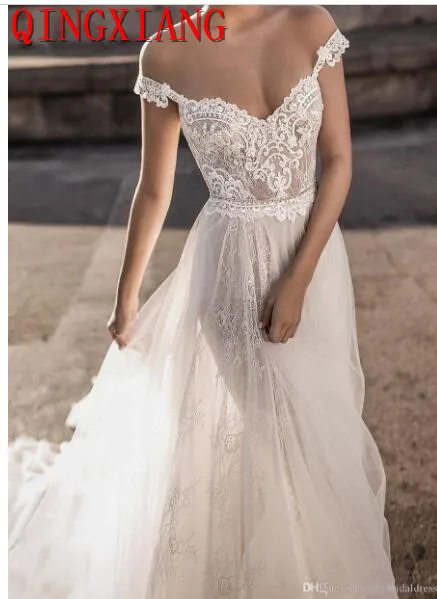 2019 See Through Sheer Bohemian Wedding Dresses Off the Shoulder Appliqued Lace Tulle Sweep Train Backless Bridal Gowns
2019 See Through Sheer Bohemian Wedding Dresses Off the Shoulder Appliqued Lace Tulle Sweep Train Backless Bridal Gowns