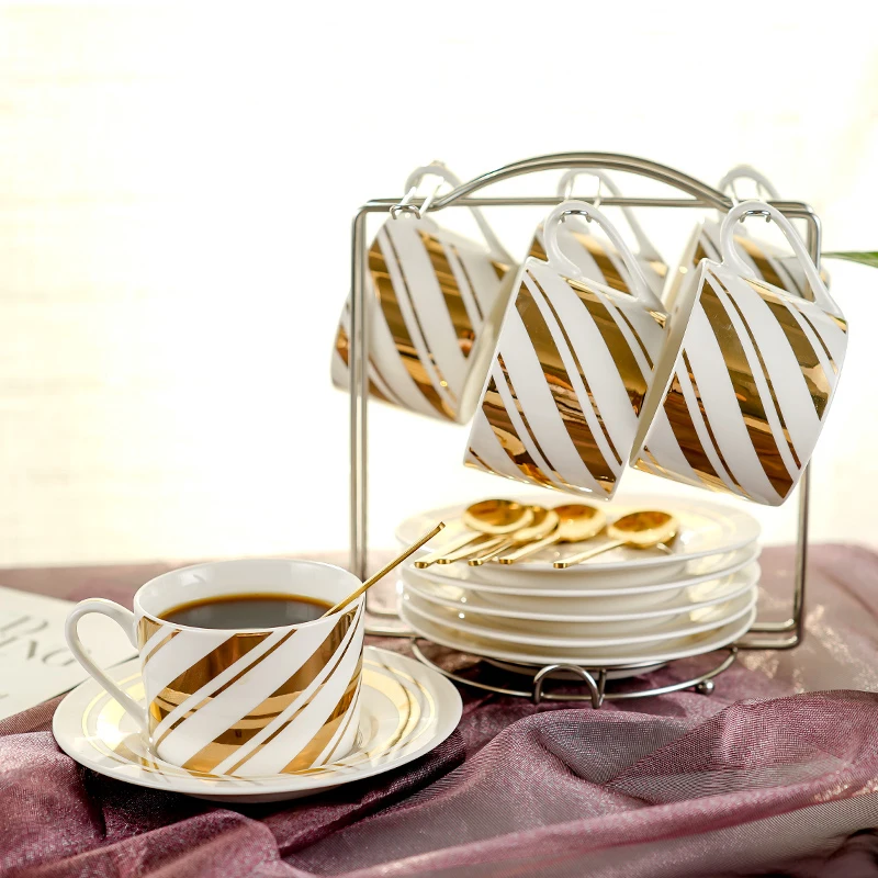 Europe Phnom Penh Ceramic Coffee Cup Set 304 stainless steel coffee spoon with Saucer cup Shelf Porcelain Tea Set
Europe Phnom Penh Ceramic Coffee Cup Set 304 stainless steel coffee spoon with Saucer cup Shelf Porcelain Tea Set