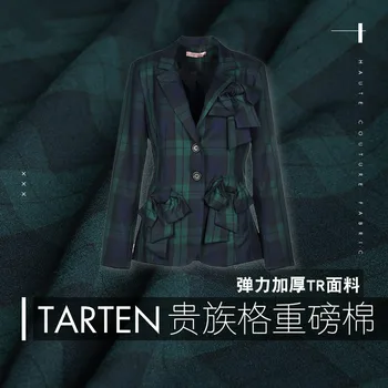 TR worsted fashion fabric 135cm wide blue and green plaid shoulder worsted wool texture 430g / m
TR worsted fashion fabric 135cm wide blue and green plaid shoulder worsted wool texture 430g / m