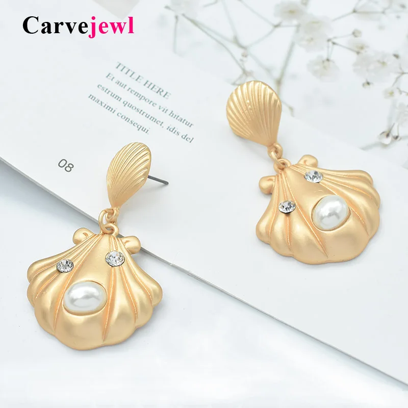 Carvejewl unique shell drop dangle earrings metal shell simulated pearl earrings for women jewelry new fashion Korean earrings
Carvejewl unique shell drop dangle earrings metal shell simulated pearl earrings for women jewelry new fashion Korean earrings