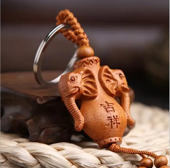 Natural peach wood double elephant bottle keychain key ring for unisex bag car fashion jewelry lucky animal elephant keychains
Natural peach wood double elephant bottle keychain key ring for unisex bag car fashion jewelry lucky animal elephant keychains