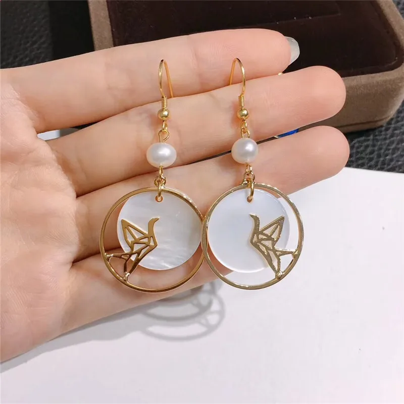 An papercranes shell earrings cranes love contracted earrings round pearl delicate women earrings jewelry wholesale
An papercranes shell earrings cranes love contracted earrings round pearl delicate women earrings jewelry wholesale