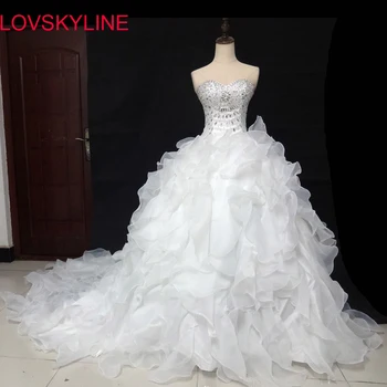Ruffle tube top luxury long trailing Bridal Sexy Cheap Price Fashionable Wedding Dresses Lace Beads Crystal Wedding Gown
Ruffle tube top luxury long trailing Bridal Sexy Cheap Price Fashionable Wedding Dresses Lace Beads Crystal Wedding Gown