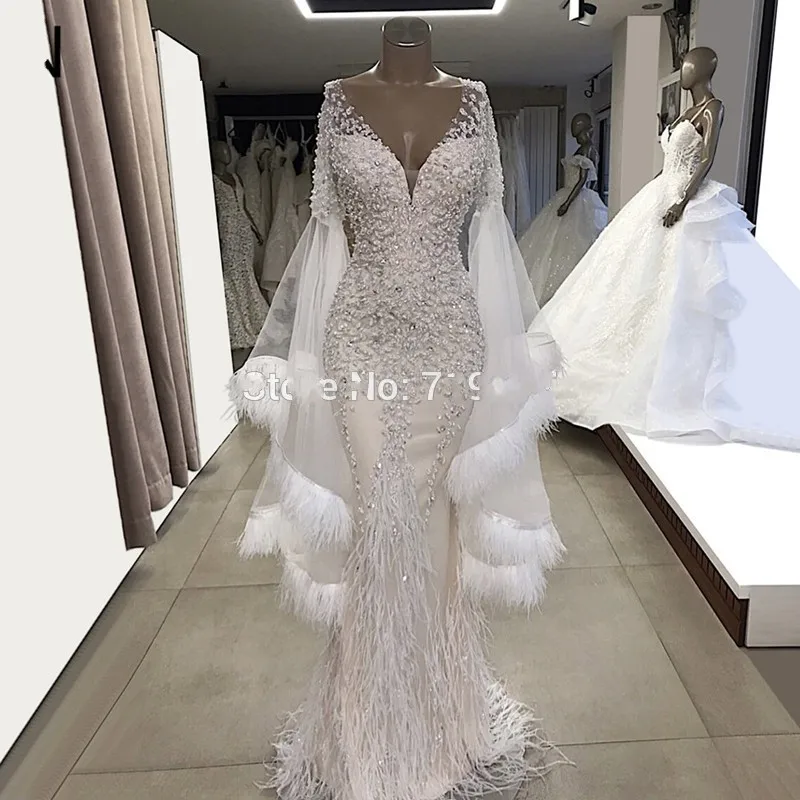 White Evening Dresses with Feather Long Sleeves Mermaid Wedding Party Gowns 2019 Couture V Neck Tulle Beaded Crystals Prom Dress
White Evening Dresses with Feather Long Sleeves Mermaid Wedding Party Gowns 2019 Couture V Neck Tulle Beaded Crystals Prom Dress
