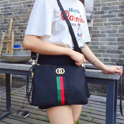Summer handbag 2019 new small handbag Oxford cloth shoulder Messenger bag envelope bag horizontal square bag
Summer handbag 2019 new small handbag Oxford cloth shoulder Messenger bag envelope bag horizontal square bag