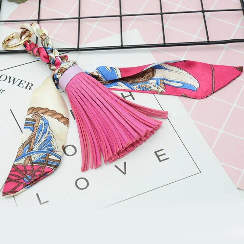 Felyskep New Silk Scarves Key Chains with PU Leather Tassels Keyring for Women Bag Charm Pendant Acessory 286WA
Felyskep New Silk Scarves Key Chains with PU Leather Tassels Keyring for Women Bag Charm Pendant Acessory 286WA