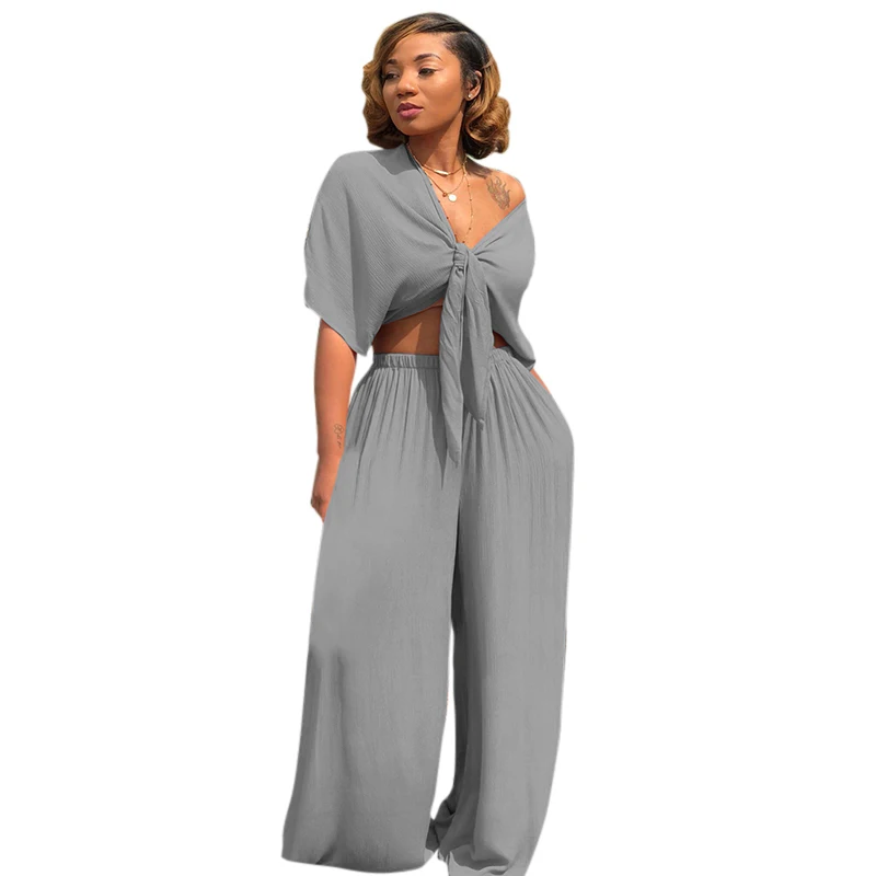 New Sexy Women Two piece Set Crop Top Deep V Neck Tie-Front Short Sleeve Wide Leg Pants Suits Elastic Waist Clothes Sets Outfits
New Sexy Women Two piece Set Crop Top Deep V Neck Tie-Front Short Sleeve Wide Leg Pants Suits Elastic Waist Clothes Sets Outfits