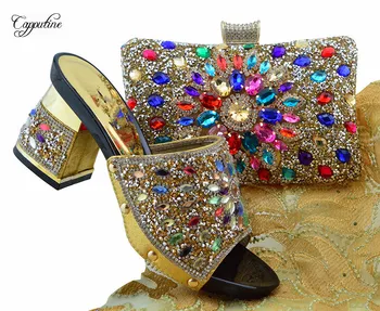 Excellent gold lady high heel shoes and handbag set with colorful rhinestones FGT004 heel height 7cm
Excellent gold lady high heel shoes and handbag set with colorful rhinestones FGT004 heel height 7cm