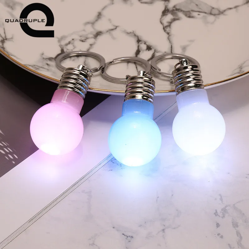 Quadruple Mini LED Light Bulb Keychain Candy Color Flash Lamp Key Rings Novelty Car Illuminate Pendant Key Chain Christmas Gift
Quadruple Mini LED Light Bulb Keychain Candy Color Flash Lamp Key Rings Novelty Car Illuminate Pendant Key Chain Christmas Gift