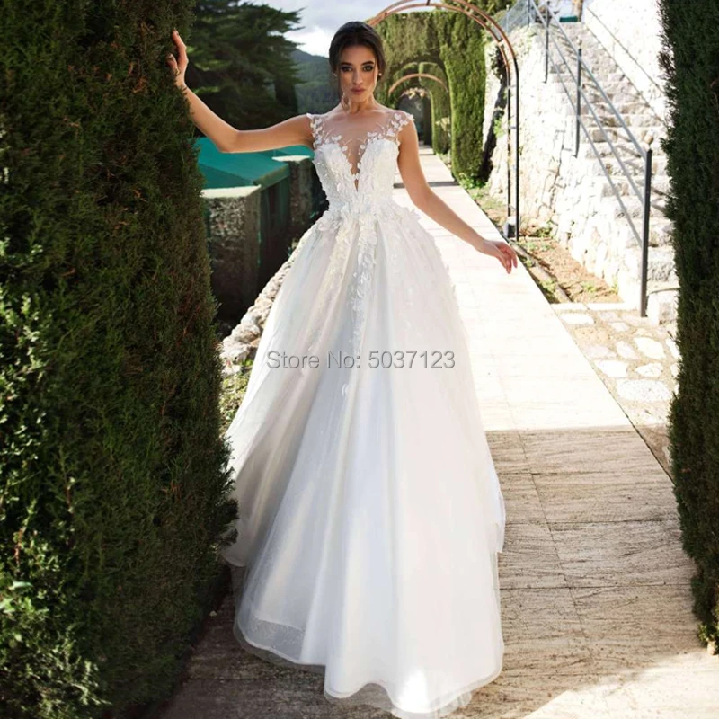 A Line Wedding Dresses 2019 Sleeveless Lace Appliques Flowers Wedding Bridal Gowns Tulle Vestido De Noiva
A Line Wedding Dresses 2019 Sleeveless Lace Appliques Flowers Wedding Bridal Gowns Tulle Vestido De Noiva