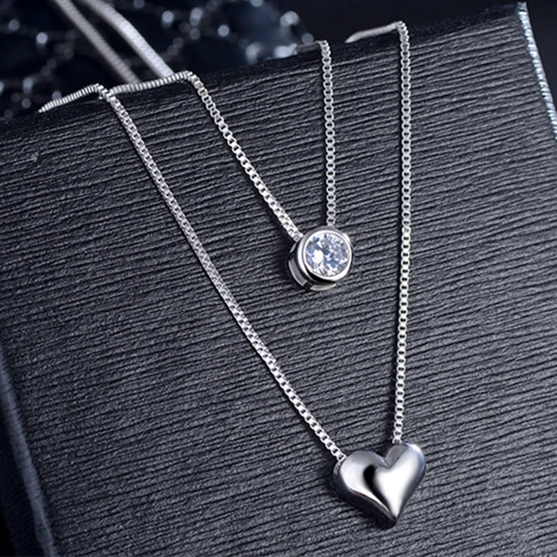 2019 New Wholesale Jewelry 925 Sterling Silver Double Layers Collarbone Necklace Chain CZ Love-heart Pendant Necklace For Women
2019 New Wholesale Jewelry 925 Sterling Silver Double Layers Collarbone Necklace Chain CZ Love-heart Pendant Necklace For Women