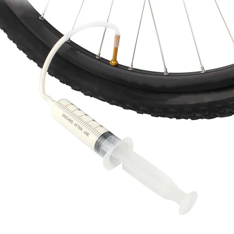 60ML Tire Filling Tool Tubeless Tyre Sealant Injector MTB Bike Bicycle Cycling Tire Filling Tool
60ML Tire Filling Tool Tubeless Tyre Sealant Injector MTB Bike Bicycle Cycling Tire Filling Tool