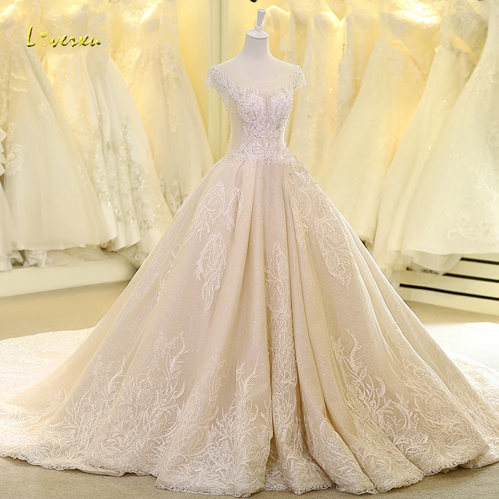 Loverxu Vestido De Noiva Sexy Illusion Lace Wedding Dress 2019 Appliques beaded Crystal Pearls Chapel Train A Line Bridal Gown 
Loverxu Vestido De Noiva Sexy Illusion Lace Wedding Dress 2019 Appliques beaded Crystal Pearls Chapel Train A Line Bridal Gown