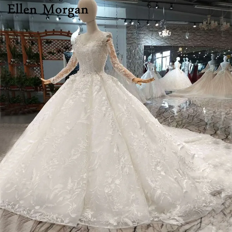 Sexy Sheer Neck Lace Ball Gowns Wedding Dresses 2019 for Women Princess Silver Crystal Long Sleeves Corset Bridal Gowns
Sexy Sheer Neck Lace Ball Gowns Wedding Dresses 2019 for Women Princess Silver Crystal Long Sleeves Corset Bridal Gowns