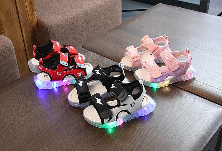 New summer fashion luminous comfort cool boy sandals children's beach shoes magic stickers girls Korean beach shoes
New summer fashion luminous comfort cool boy sandals children's beach shoes magic stickers girls Korean beach shoes