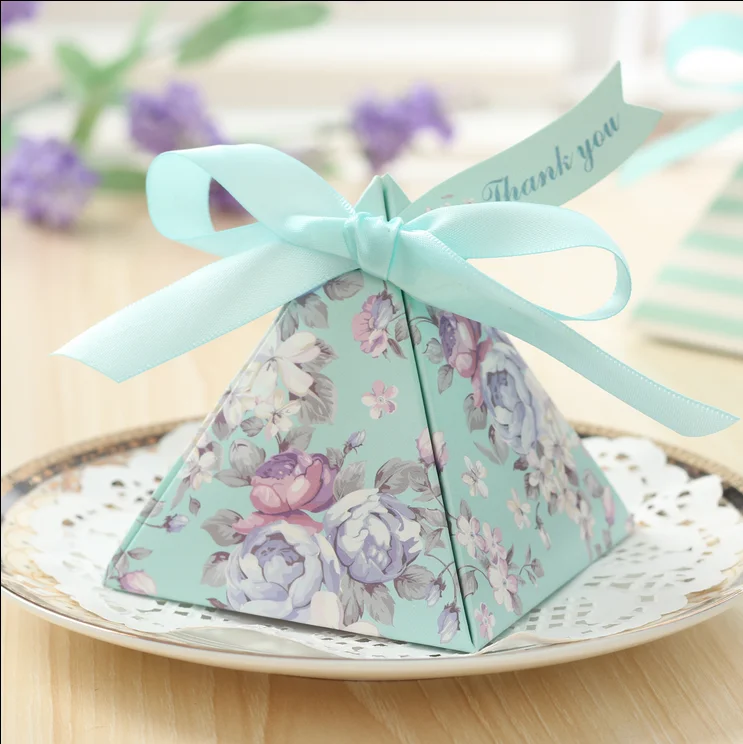 20pcs European Triangular Pyramid Light blue Floral Wedding Favors Candy Boxes Party Return Present Gifts Box + Ribbons + Tags
20pcs European Triangular Pyramid Light blue Floral Wedding Favors Candy Boxes Party Return Present Gifts Box + Ribbons + Tags