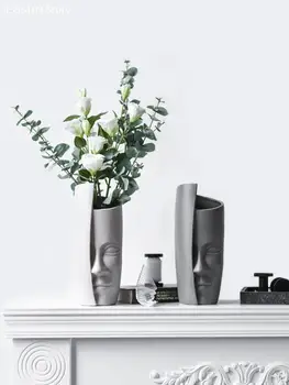 Creative abstract human face vase interior decoration unique ceramic vase living room countertop vase wedding decoration vase
Creative abstract human face vase interior decoration unique ceramic vase living room countertop vase wedding decoration vase