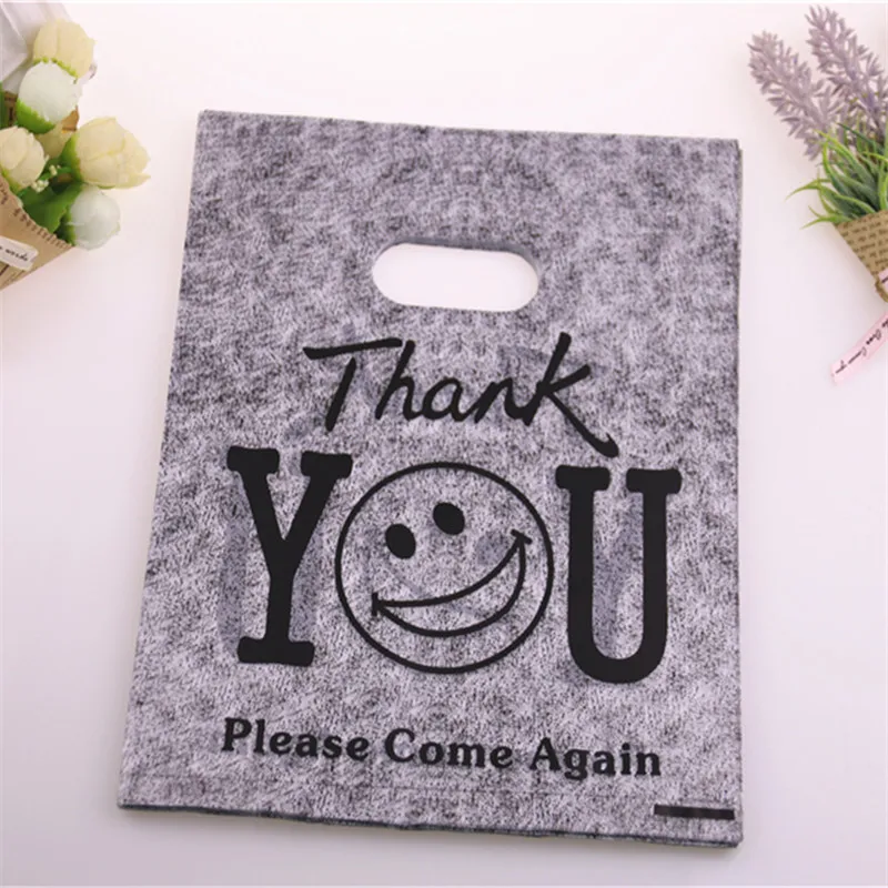 New Design Wholesale 100pcs/lot 20*25cm Christmas Packaging Bags with Smile Face Shopping Plastic Bags With Thank You
New Design Wholesale 100pcs/lot 20*25cm Christmas Packaging Bags with Smile Face Shopping Plastic Bags With Thank You
